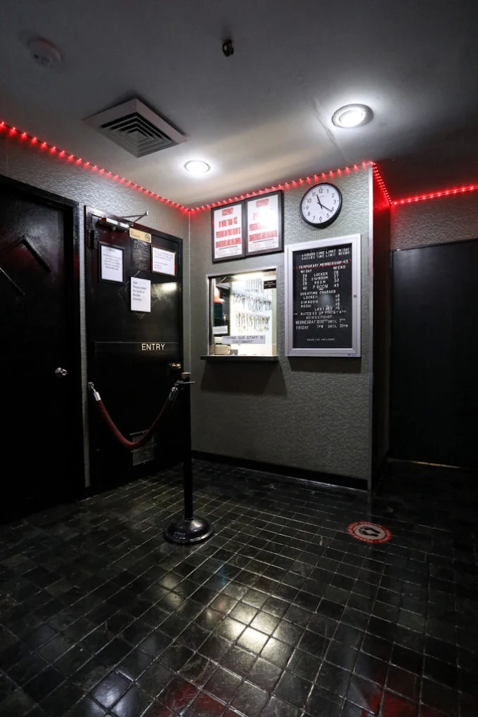 Street entrance of East Side Club at 227 East 56th Street